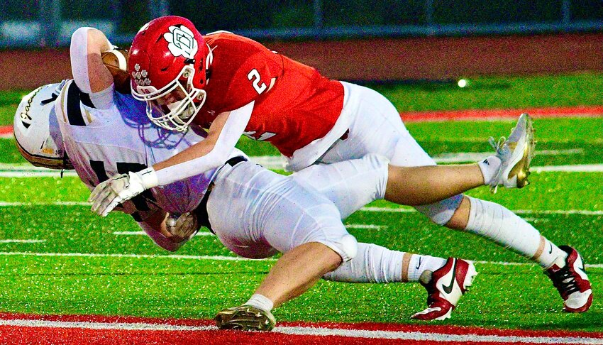 OZARK'S MARCUS HEAVIN stops a Lebanon ball-carrier last week.