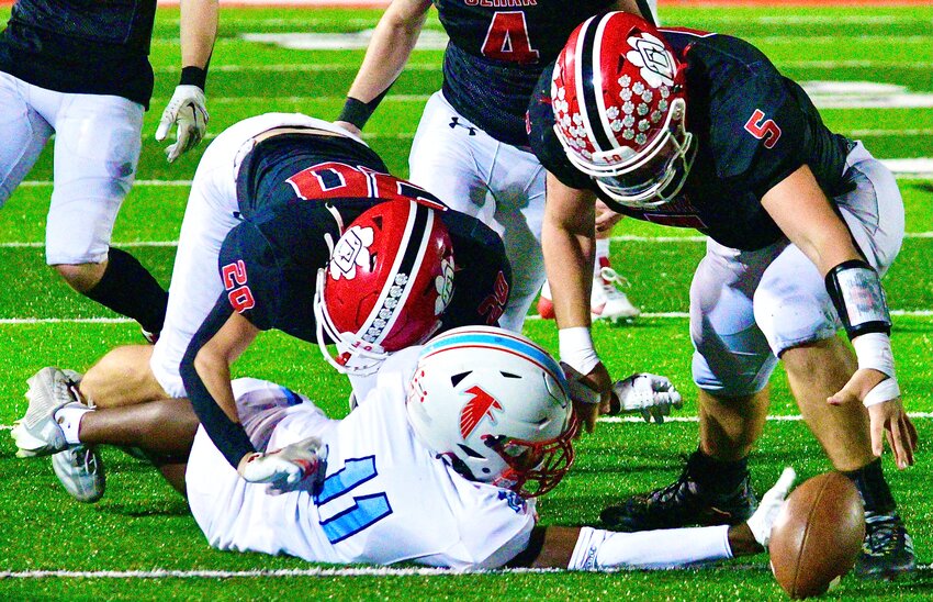 OZARK'S SAM SAVICH recovers a Glendale fumble.