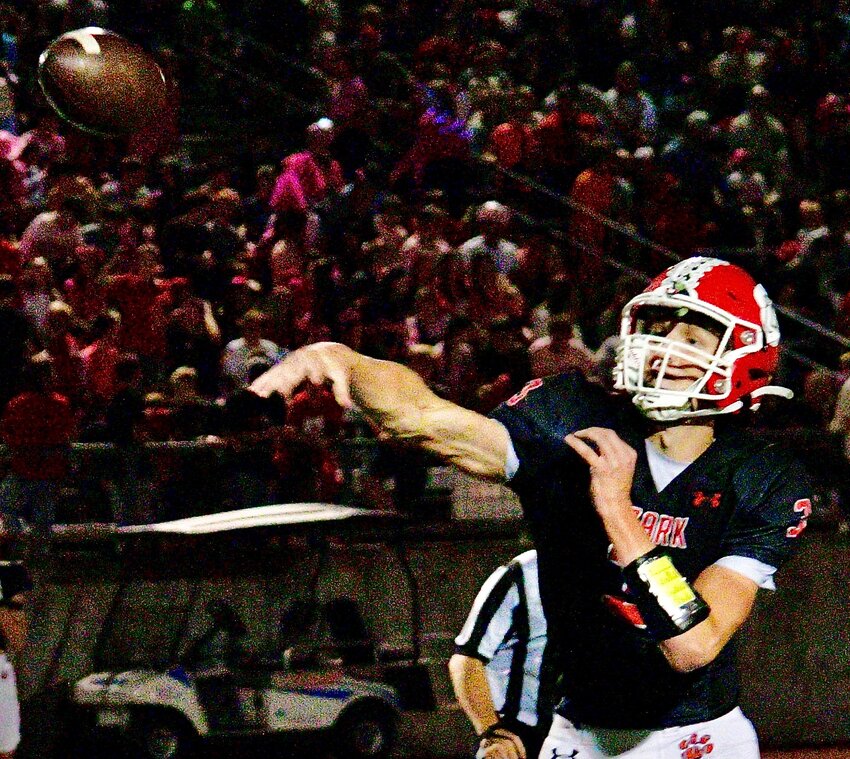 OZARK'S PEYTON RUSSELL follows through on a pass last week.