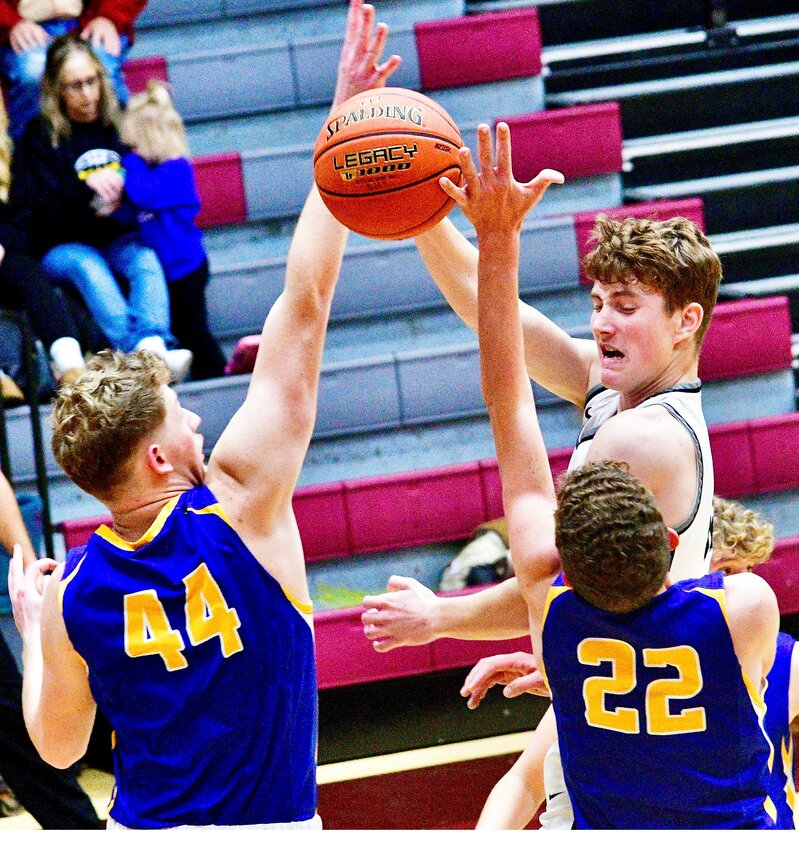SPARTA'S BRAYLEN LUTTRULL makes a pass in the paint at the Strafford Tournament earlier this week.