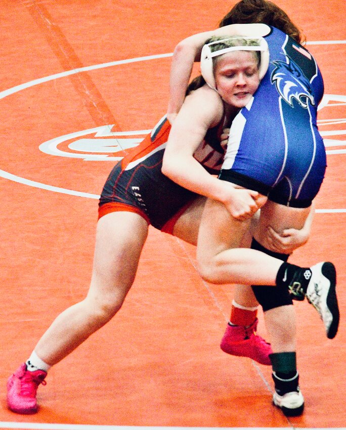 NIXA'S ADDISON HARKINS gains control of her opponent.