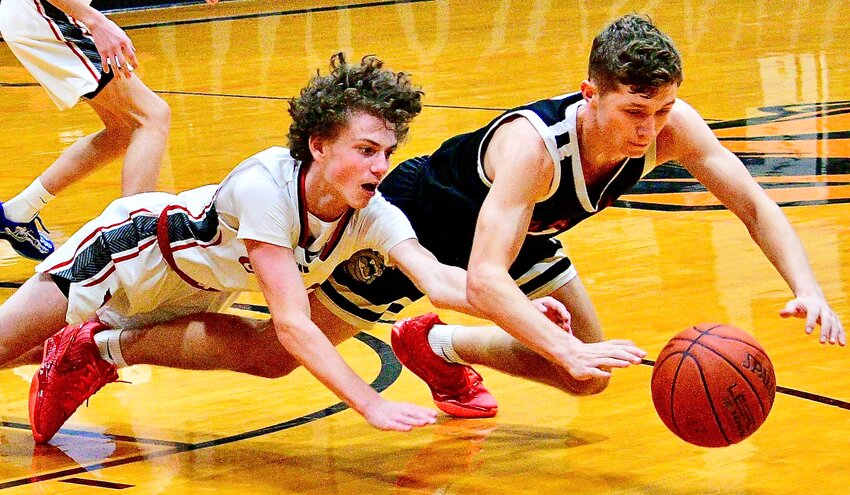 CHADWICK'S CREEK GUERIN dives for a loose ball against El Dorado Springs.