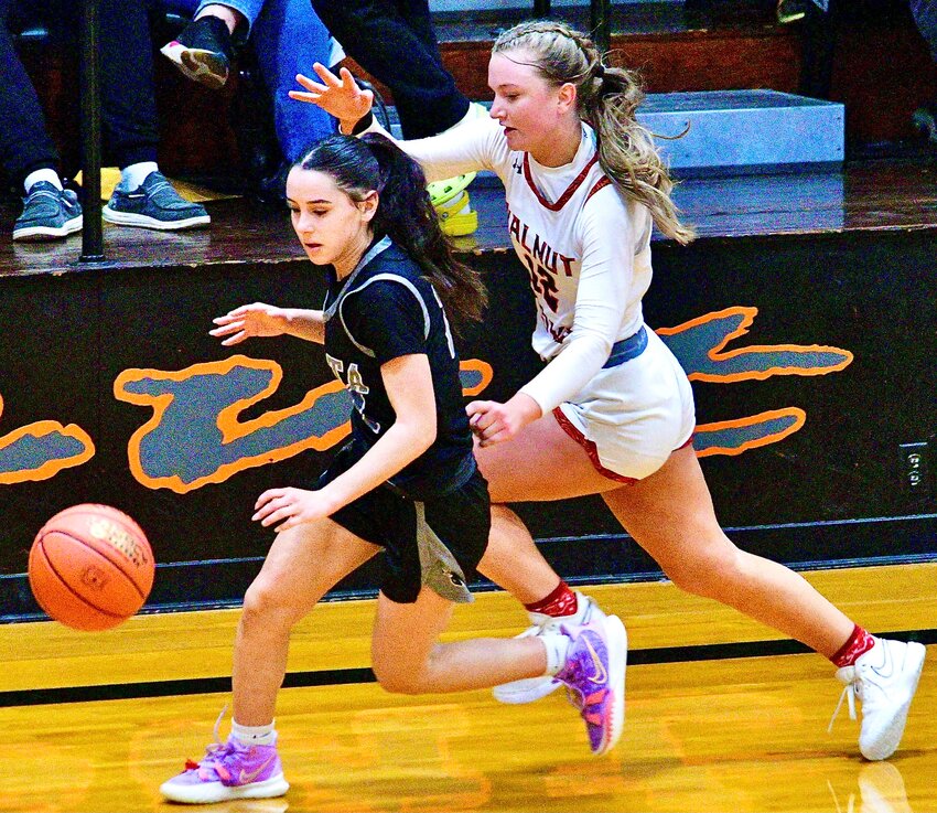 SPARTA'S SOPHIE LILLY races away from a Walnut Grove defender.
