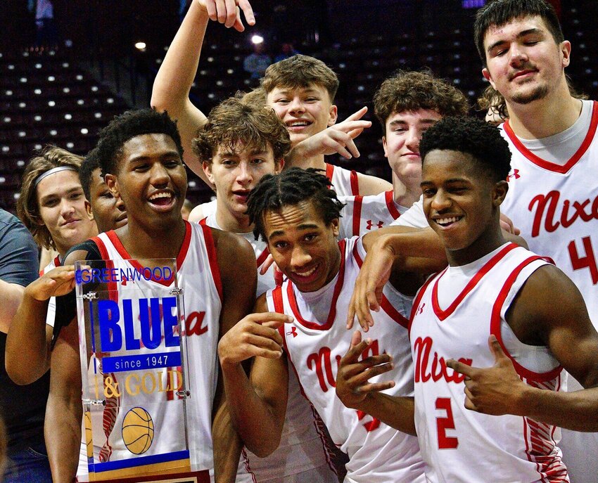 NIXA PLAYERS celebrate their Blue &amp; Gold Tournament title a year ago.