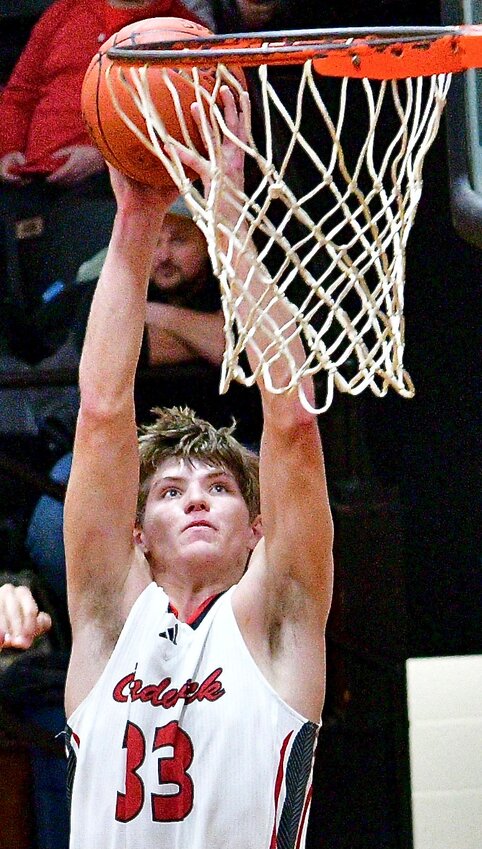 CHADWICK'S CLAYTON GARRISON eyes a bucket Monday at the Walnut Grove Holiday Tournament.
