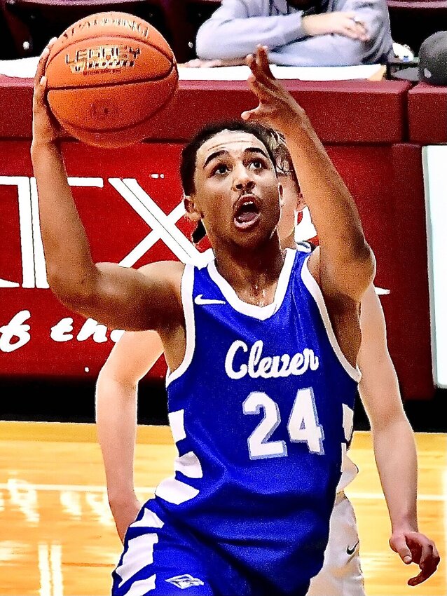 CLEVER'S ELI BUSSARD makes a move to the bucket at the Blue &amp; Gold Tournament.