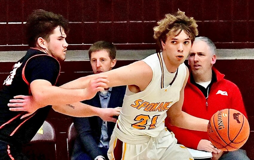 SPOKANE'S KASEN BLAUE makes a move to the bucket versus Ash Grove on Friday.