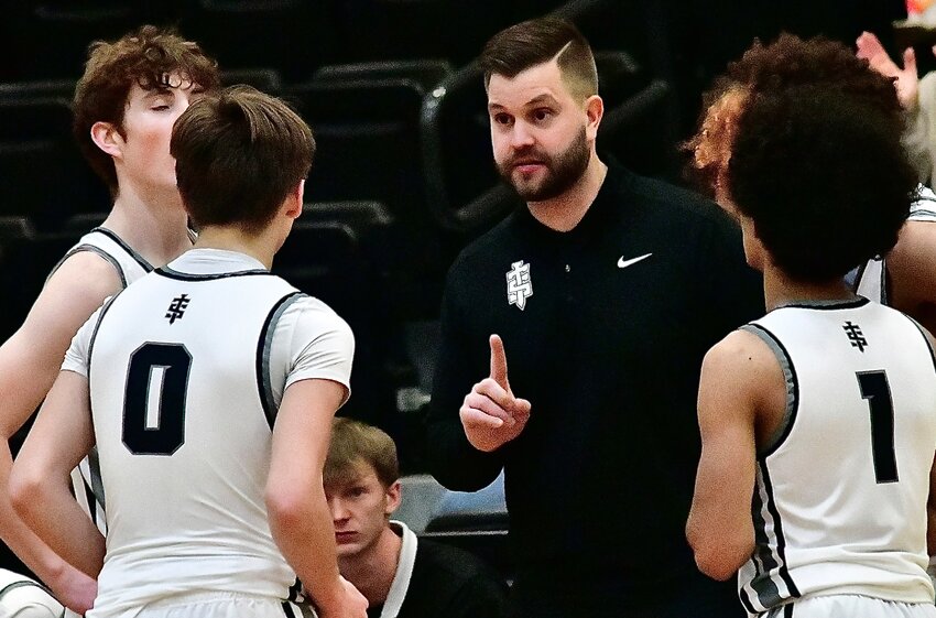 SPARTA COACH DERIC LINK and the Trojans will host the Sparta Tournament this week.