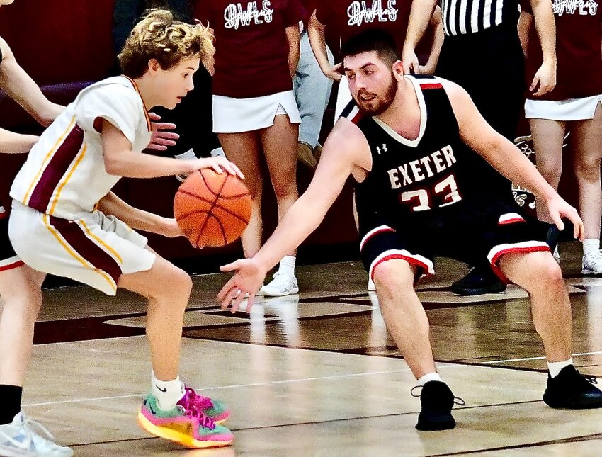 SPOKANE'S CARTER DAVIDSON dribbles opposite an Exeter defender.