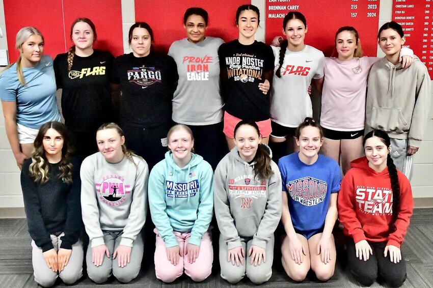 NIXA'S GIRLS WRESTLING TEAM includes (front row, l-r) Ashton Mayes, Kamryn Bourbon, Addison Harkins, Abgial Weitzel, Brylee James, Mylee Harper, (back row, l-r) Natalie Edmisson, Jessie Nelson, Cali Dupree, Larissa Downs, Ava Frye, Abigail Counts, Dani Hartley and Hanna Egley.