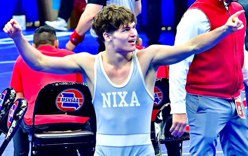 NIXA'S REED WILSON celebrates his semifinal victory.