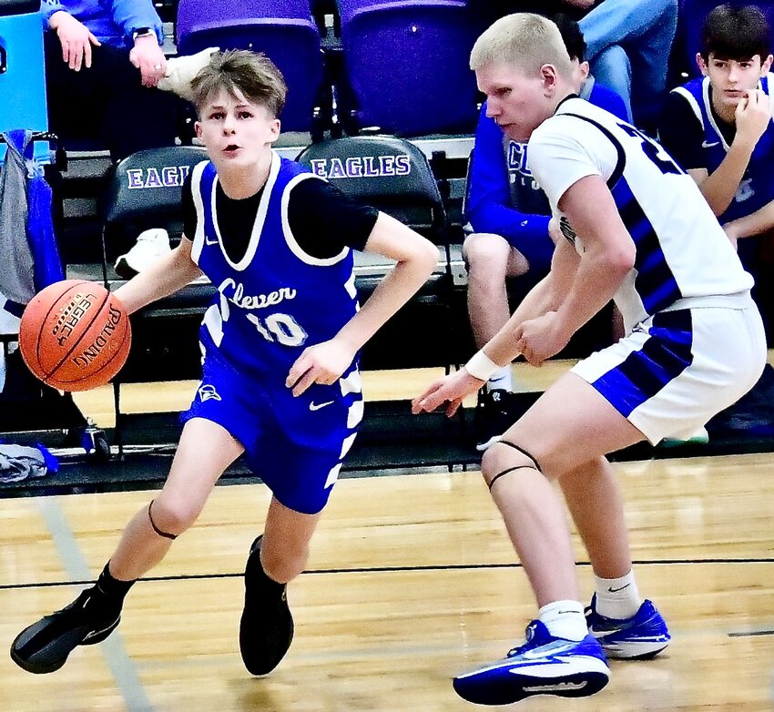 CLEVER'S COLESON CUPIT, left, penetrates to the hoop in District action against Greenwood last week.