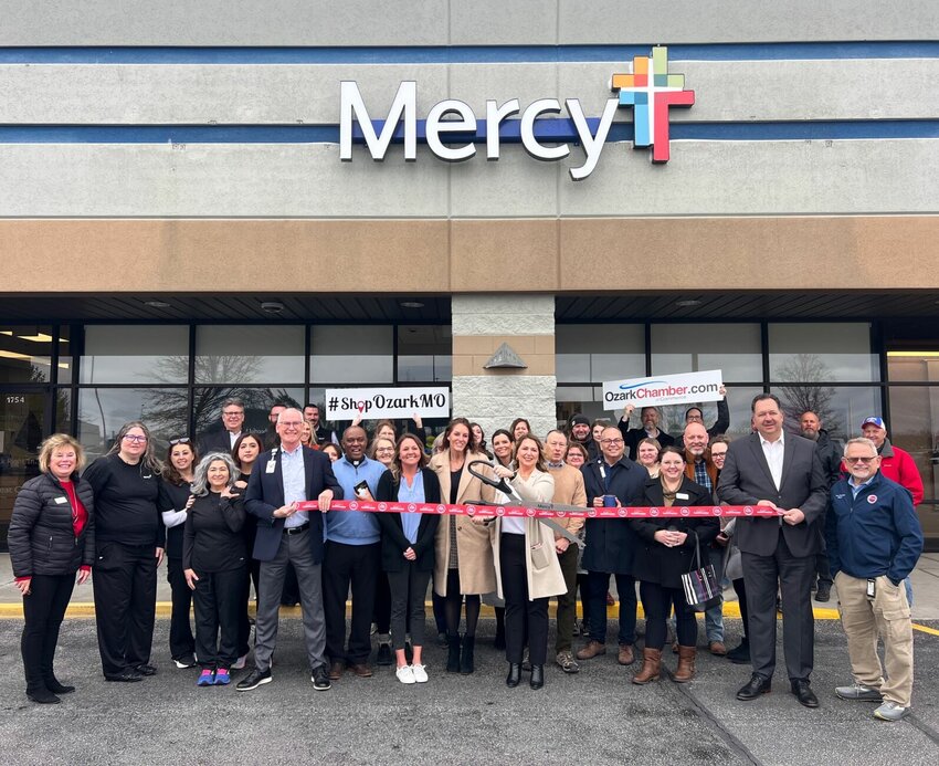 Mercy's team members and Ozark community leaders gather for the ribbon cutting ceremony that marked the official opening of Mercy's second primary care location in Ozark. Photo provided by Ettie Berneking, Mercy Media Relations and Communications manager.