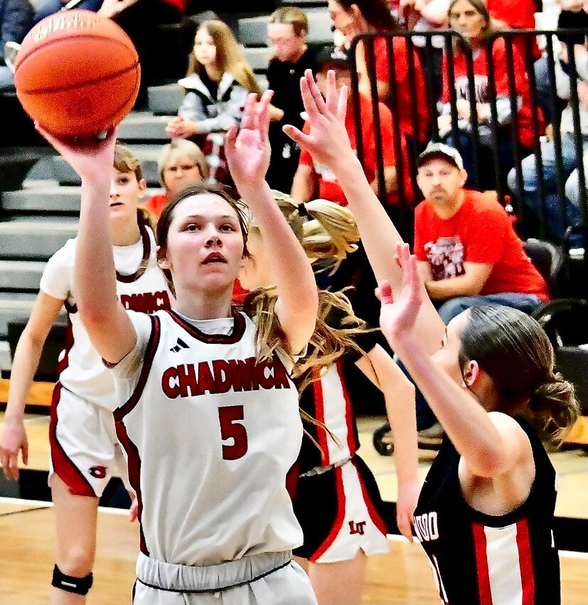 CHADWICK'S RAE LITTLE eyes a jumper against Lockwood in Quarterfinal action last weekend.