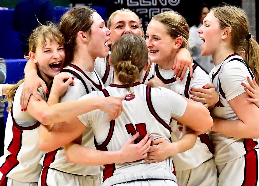 CHADWICK PLAYERS are all smiles during their state championship celebration Saturday.