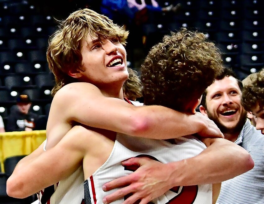 CHADWICK'S CLAYTON GARRISON AND TRISTAN SMITH share a hug.