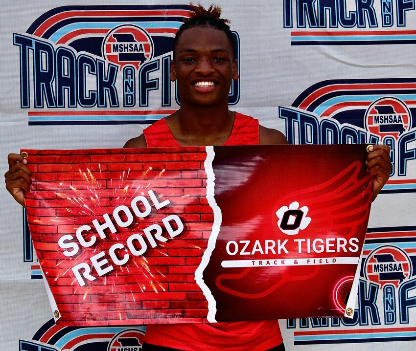OZARK'S KANNON WILLIAMS is the Tigers' school record-holder in the 200.