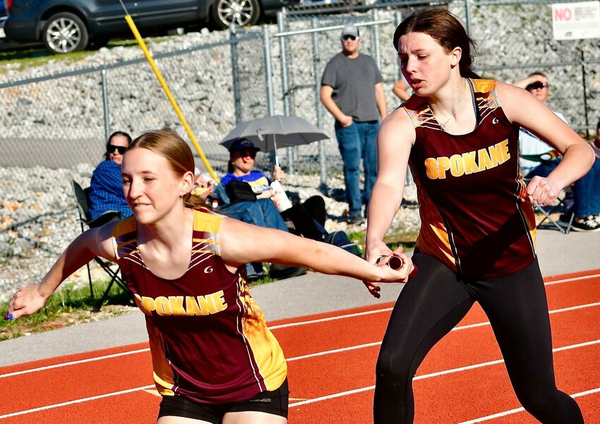 SPOKANE;S MADDIE HARDEE AND MAKENNA GIDEON complete an exchange last year.