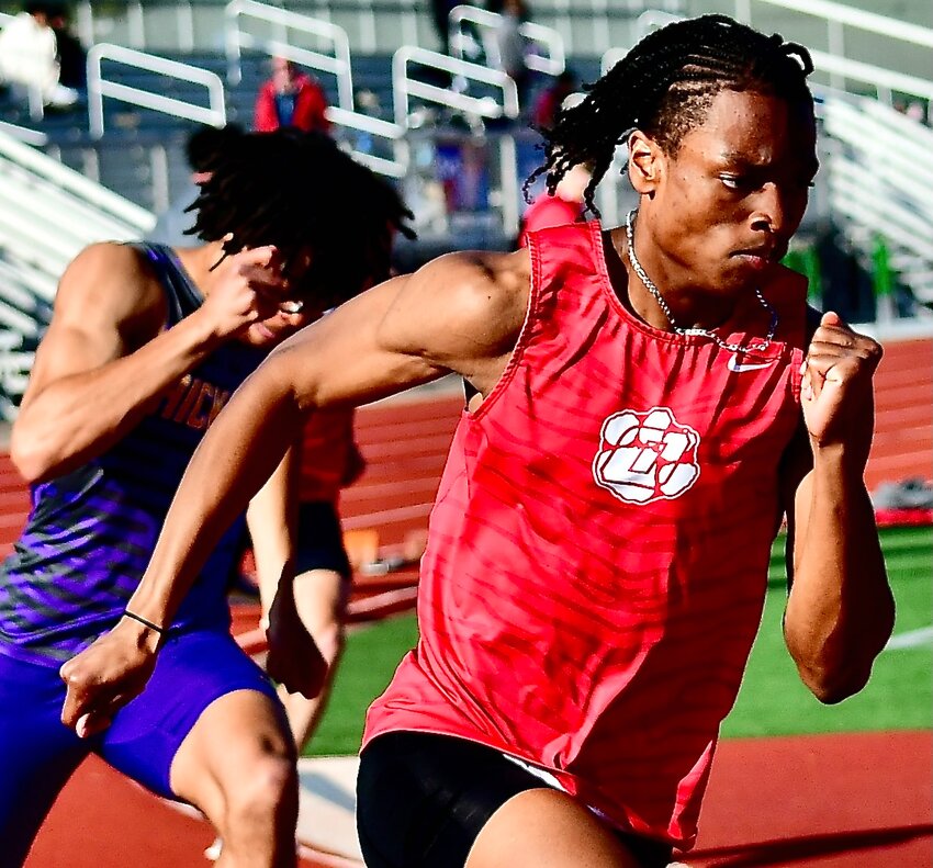 OZARK'S KANNON WILLIAMS races to a first in the 200 Friday.