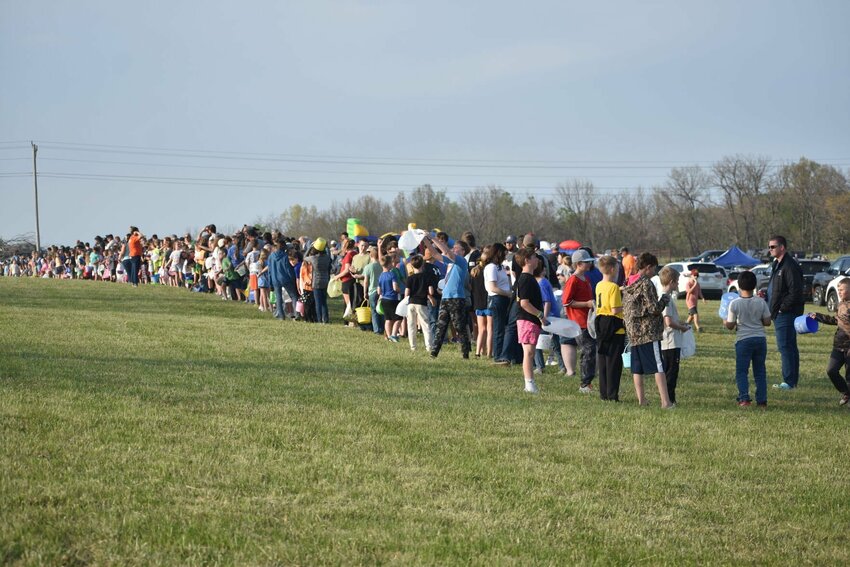 Eager for the event to begin, kids attending the Clever Egg Drop wait patiently for the signal to begin gathering eggs. All photos by Steve Chapman