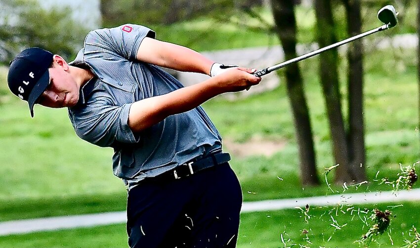 OZARK'S RILEY FRANKLIN follows through on a shot from a fairway.