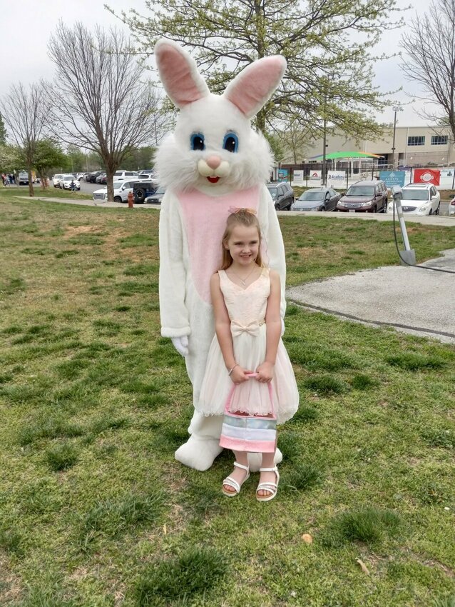 Prsephany Sampson, 7, meets the Easter Bunny prior to the egg hunt. All photos by Steve Chapman