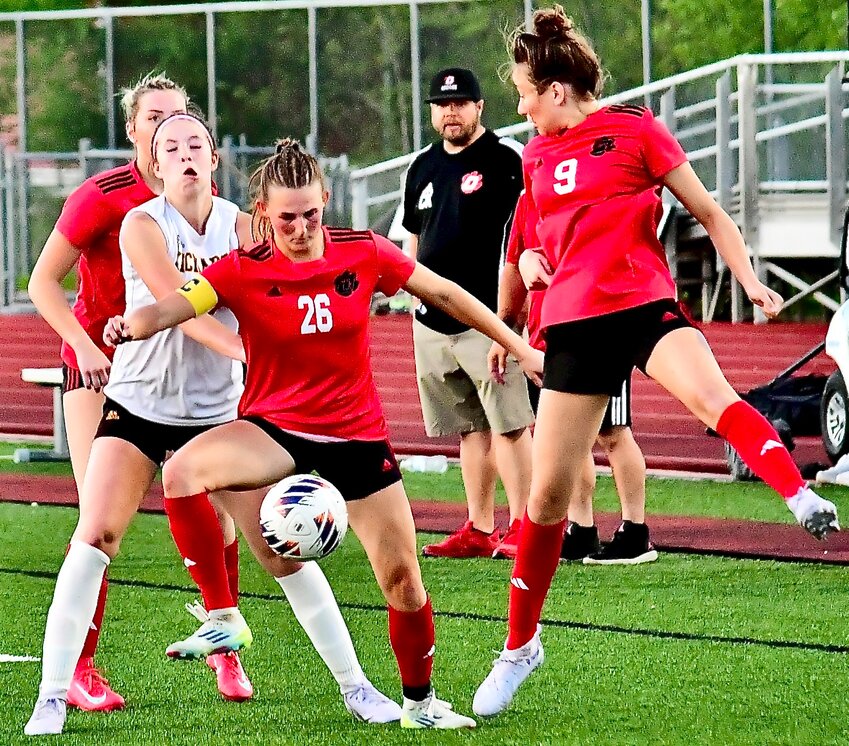 OZARK'S ADDISON SHULER controls the ball against Kickapoo on Tuesday.