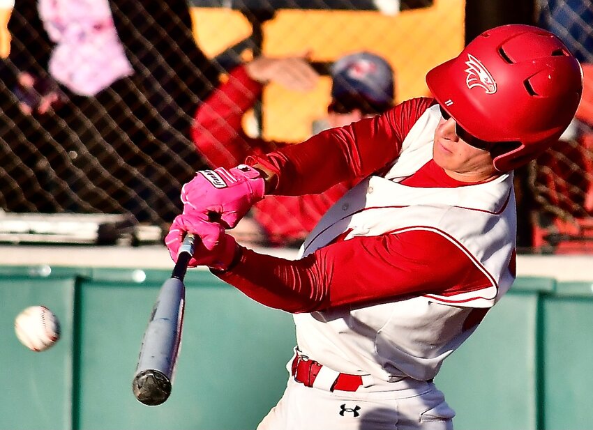 NIXA'S WYATT MABE makes contact at-bat versus Fayetteville on Friday.