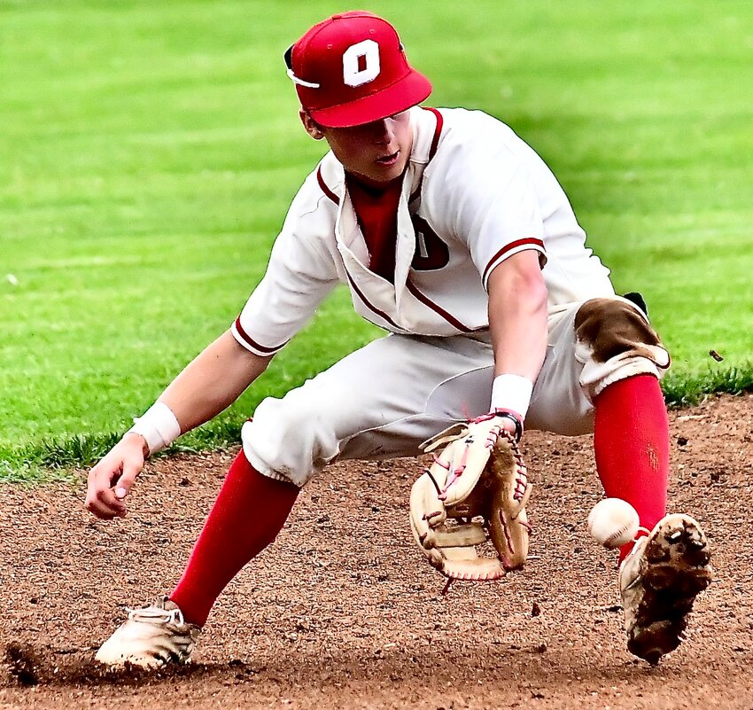OZARK'S BRODY JULIAN makes a backhand stop on a ground ball.
