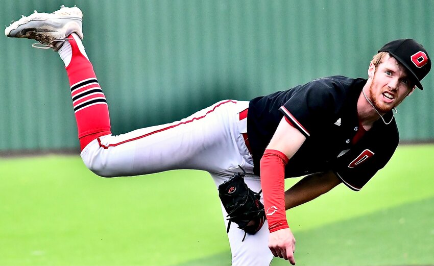 OZARK'S COOPER PUMPHREY follows through on a delivery at Glendale on Tuesday.