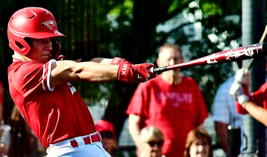 NIXA'S TYLER YONKERS follows through on a swing in the Eagles' win at Glendale on Thursday.