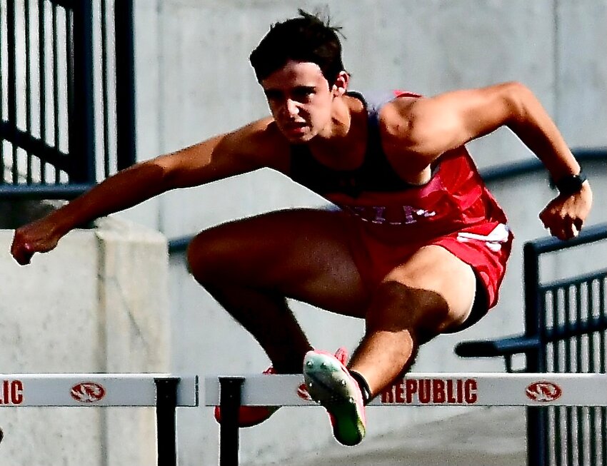 NIXA'S ROCCO NEAL clears a hurdle.