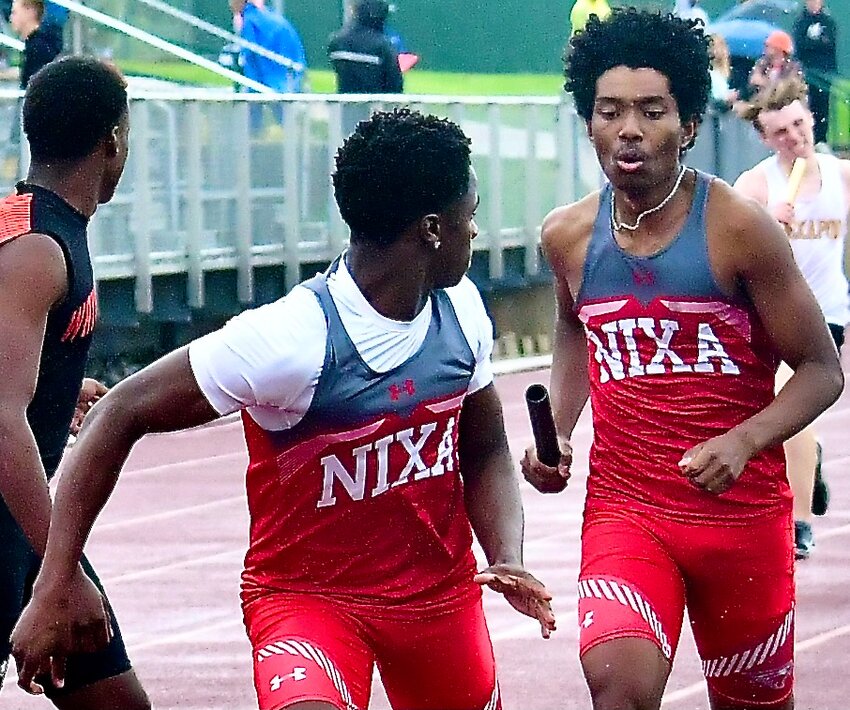 NIXA'S KEIVON FLINT AND JAREN DAVIS get set to pass the baton.