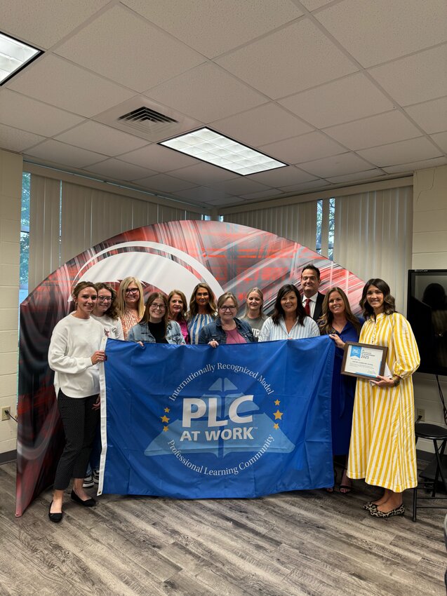 Century Elementary faculty receive recognition after the school was named a model professional learning community. Photos courtesy of Nixa Public Schools.