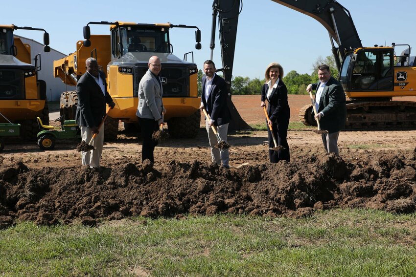 Speakers at the groundbreaking event pose for a photo. From left: Denver Caldwell, Vice President, John Deere Aftermarket &amp; Customer Support; Ryan Campbell, President, John Deere Worldwide Construction &amp; Forestry and Power Systems; Kevin Schrag, Manager, John Deere Reman; Martha Smartt, City Administrator, Strafford, Mo.; Matt Morrow, President and CEO, Area Chamber of Commerce, Springfield, Mo. Photo courtesy of Dan Bernick, Public Relations manager at John Deere.
