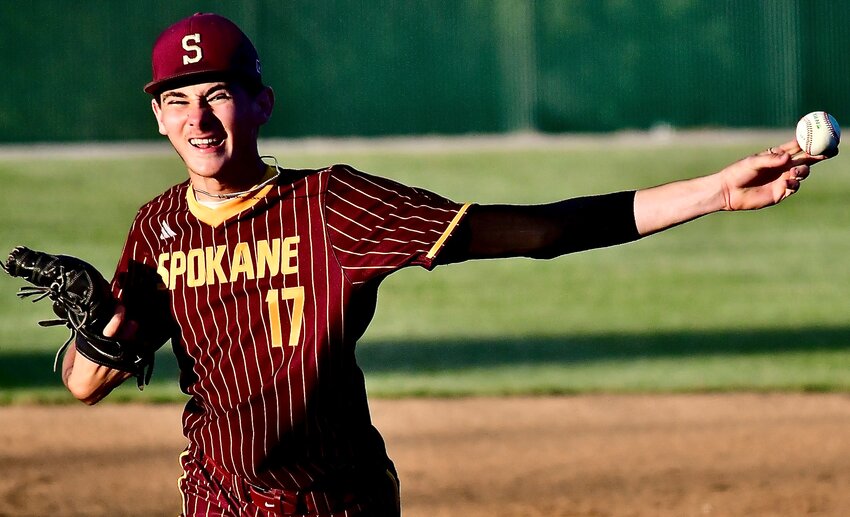 SPOKANE'S LEIF CALTON eyes a delivery home against Ava in Class 3 District 11 play Friday.