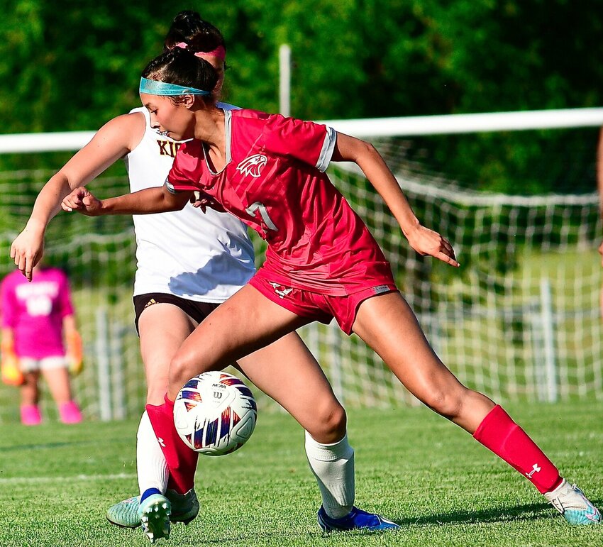 NIXA'S LONDON KIRK and the Lady Eagles are vying to repeat as District champs.