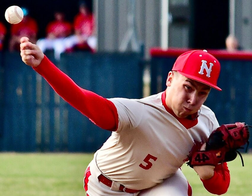 NIXA'S COLIN KELLEY fires a pitch home.