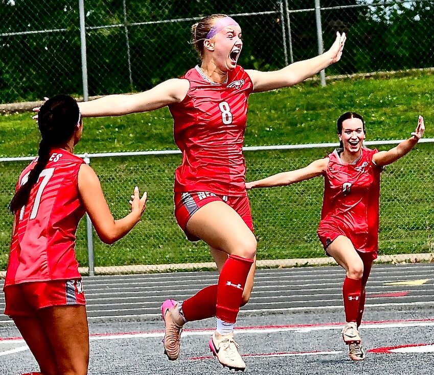 NIXA'S SHAELEE FRANCK jumps for joy after scoring the only goal in the Lady Eagles' 1-0 victory Saturday.