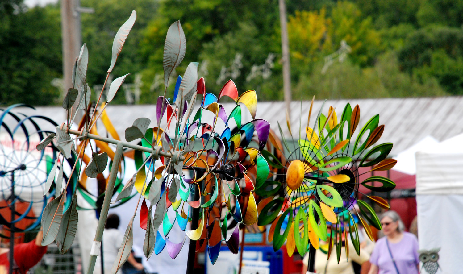 THE OZARK UTOPIA CLUB began helping the Ozark Chamber of Commerce with the yearly craft fair at Finley River Park in 1974, and has since assumed control of the event as its key fundraiser.