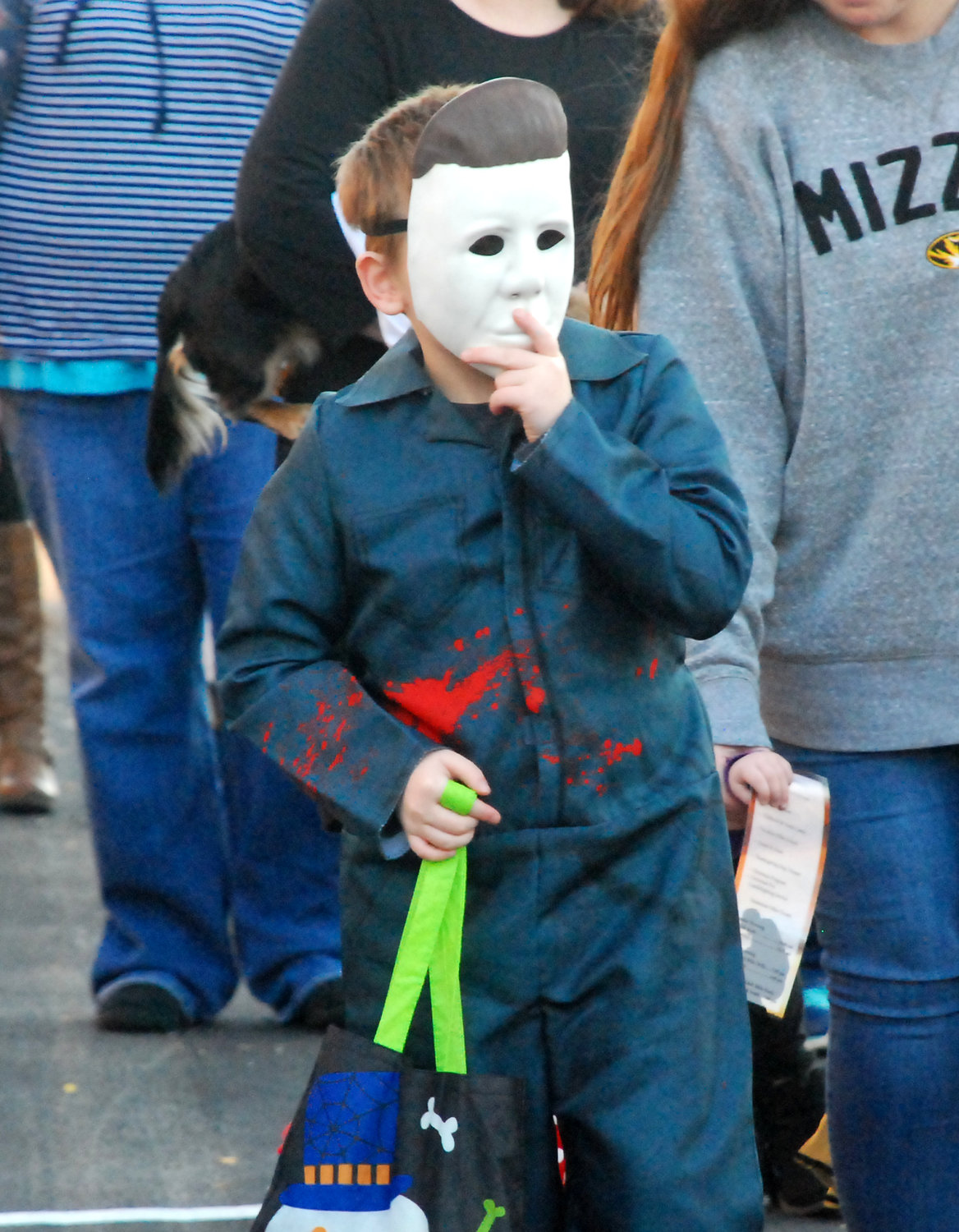 MICHAEL MYERS of the “Halloween” movie franchise walks along North Second Avenue in Ozark.