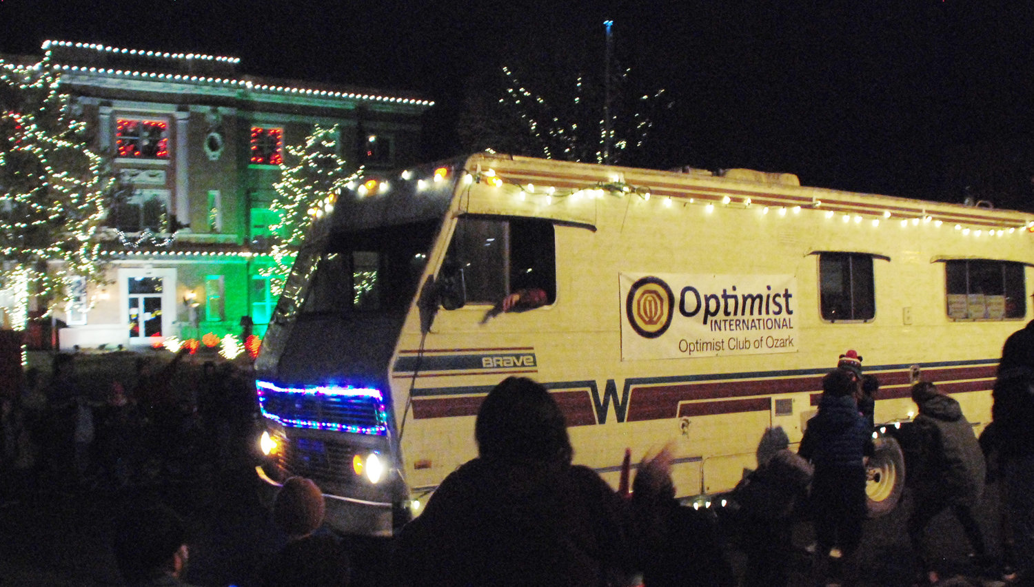 COUSIN EDDIE drives down North Second Avenue in Ozark in an authentic Winnebago recreational vehicle, representing the Optimist Club of Ozark.