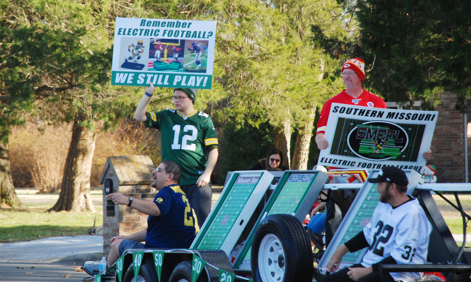 MEMBERS OF THE SOUTHERN MISSOURI ELECTRIC FOOTBALL LEAGUE celebrated their game by showing off their boards in the Nixa Christmas Parade. The group plays its games in Nixa, with playoffs set to begin in January.