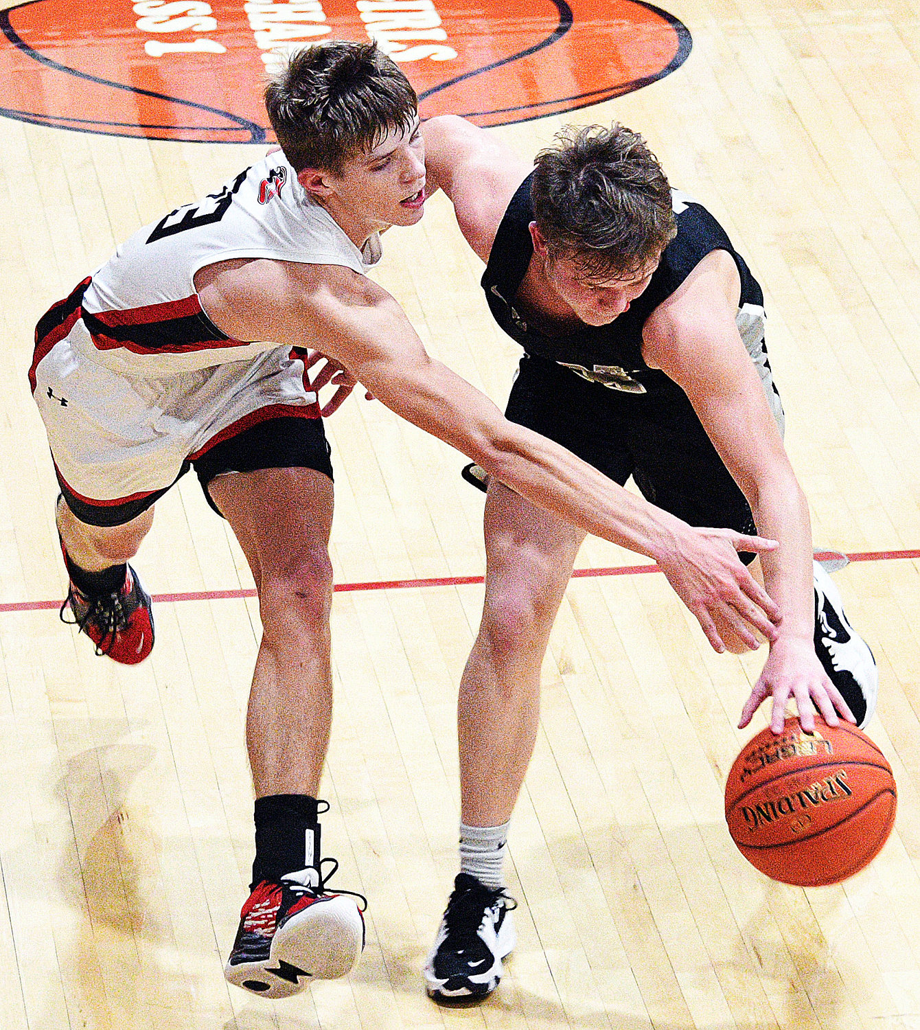 CHADWICK’S CLAYTON GARRISON tries to steal the ball away from Sparta’s Mason Letterman.