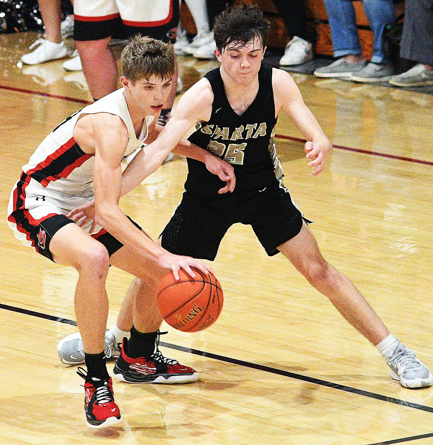 CHADWICK’S CLAYTON GARRISON controls the ball in front of Sparta’s Mason Letterman.