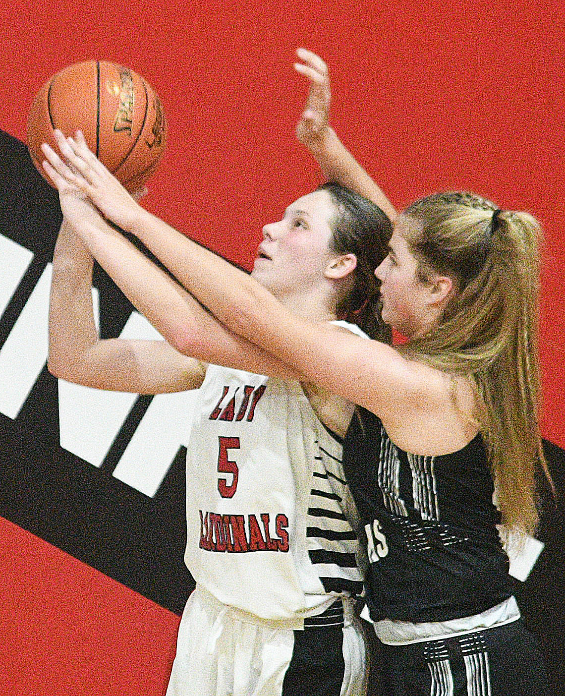 CHADWICK’S RAELIGH LITTLE shoots while being defended by Sparta’s Brooklyn Roller.