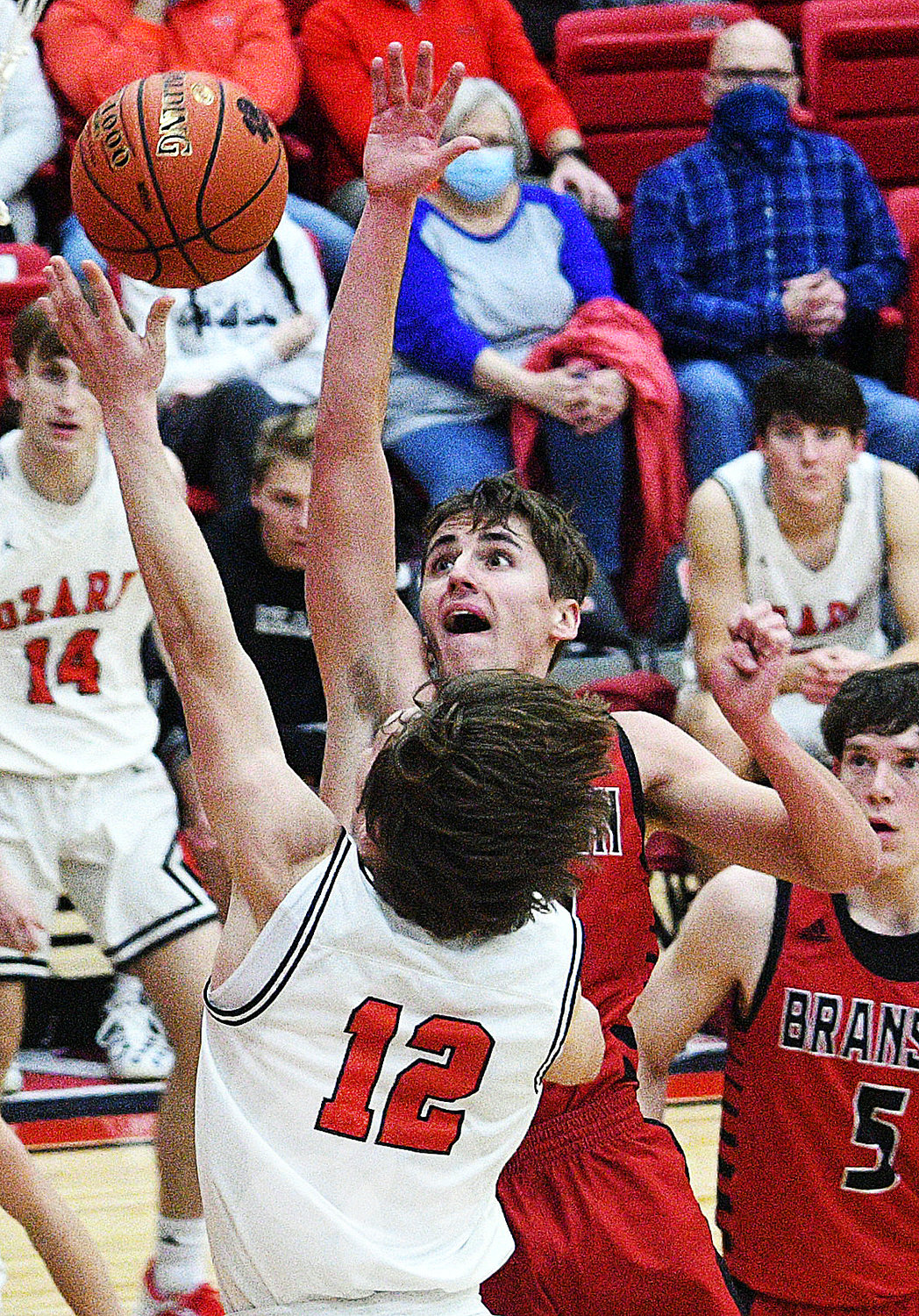 COLTON BALLARD shoots in front of a Branson defender.