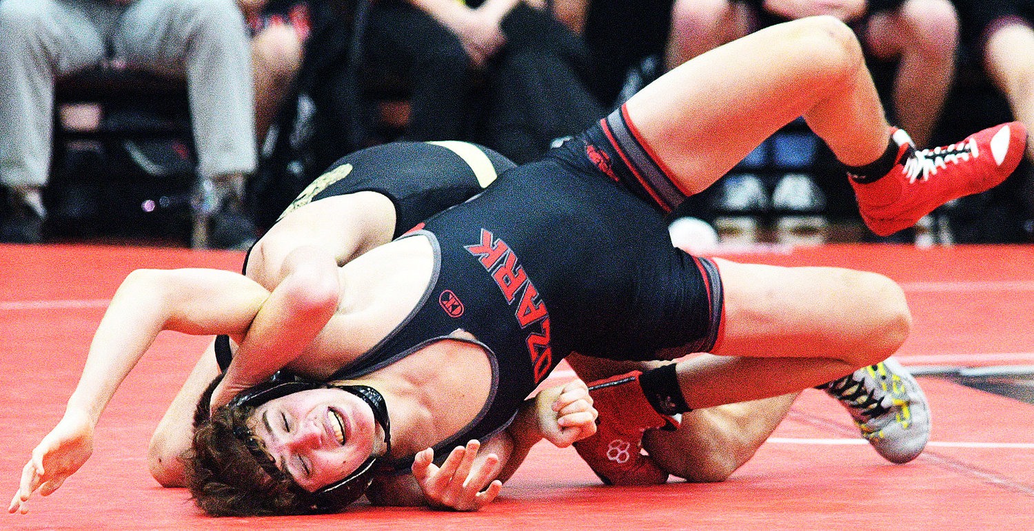 DANIEL LANEY looks to escape from a Neosho wrestler.