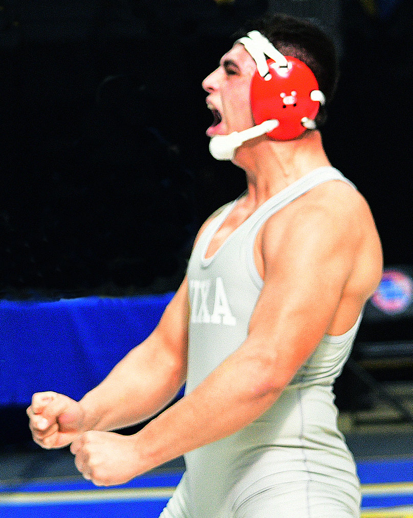 NIXA’S JOHN GHOLSON celebrates his victory in his final match as an Eagle.