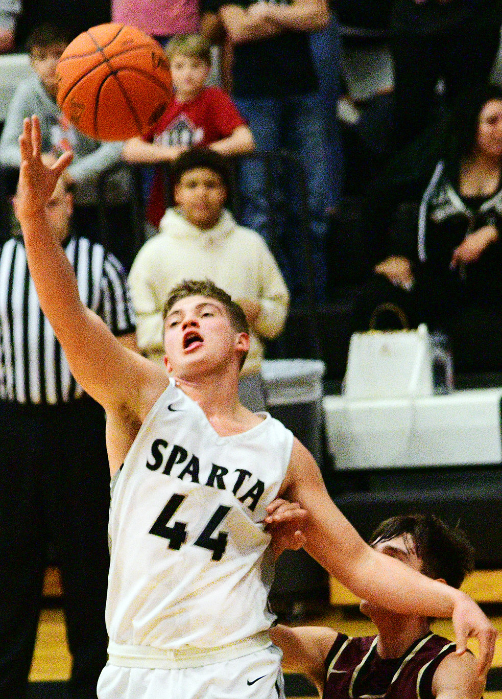 SPARTA’S DEXTER LOVELAND chases down a loose ball.